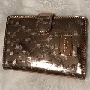 Rose gold Michael Kors Passport Holder